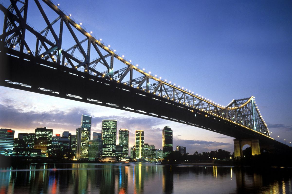 Story Bridge over the Brisbane River with city skyline at dusk